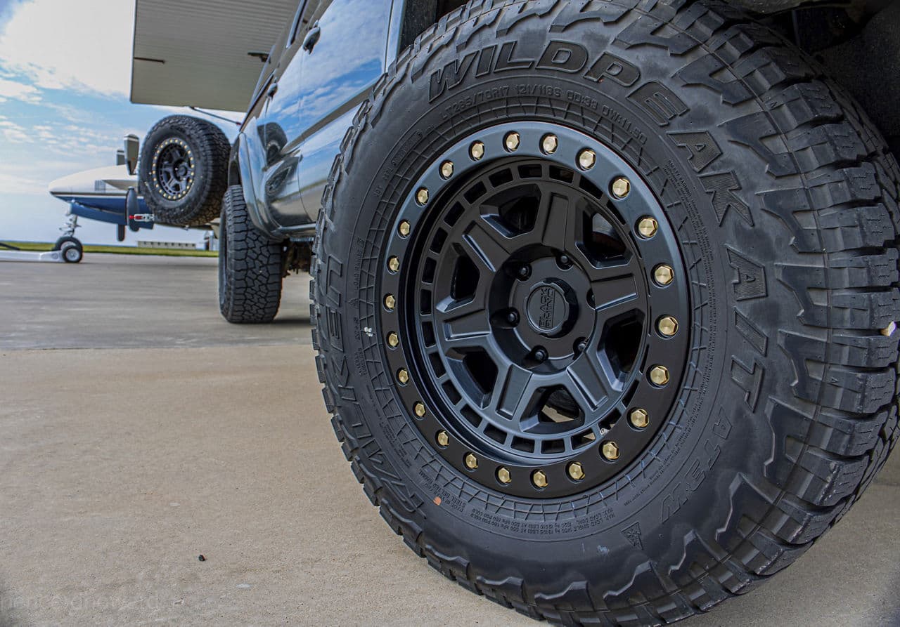 Rear view of 2014 Toyota Tacoma with truck suv wheels