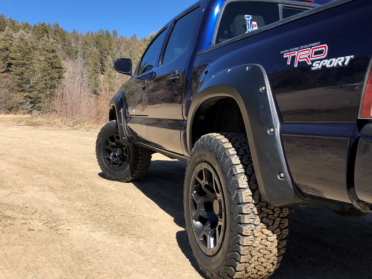 Rear view of 2014 Toyota Tacoma with wheels
