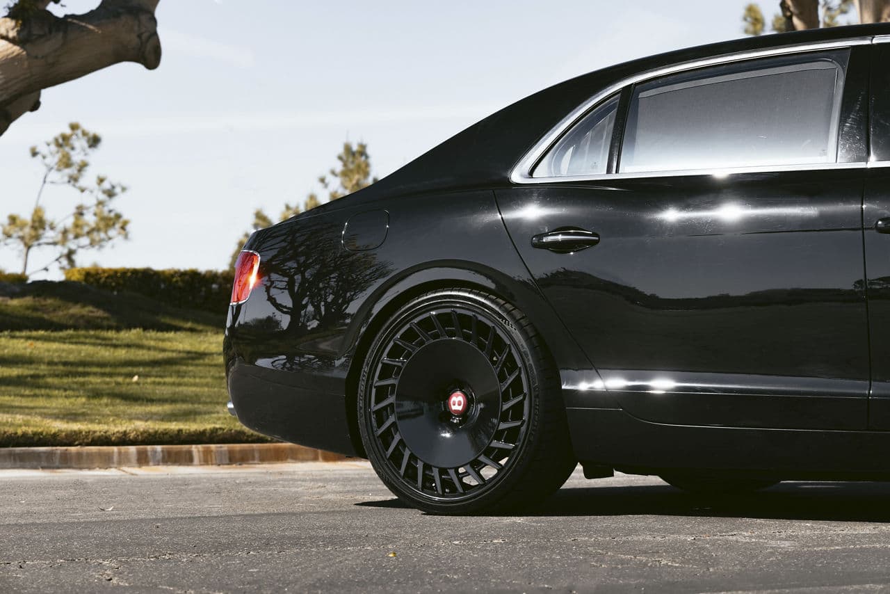 Rear view of 2015 Bentley Flying Spur with wheels