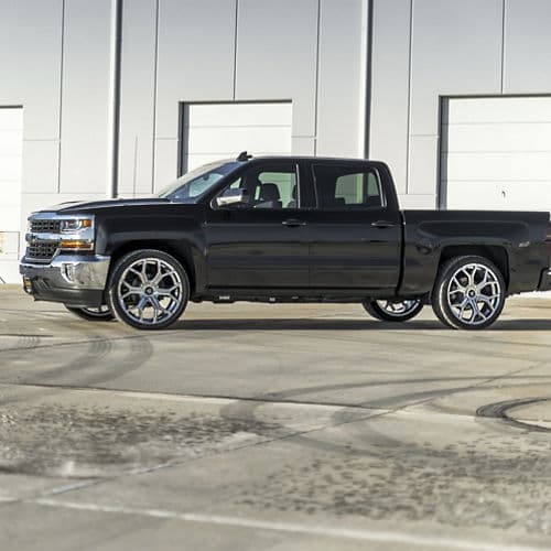 Detail view of 2015 Chevrolet Silverado with wheels