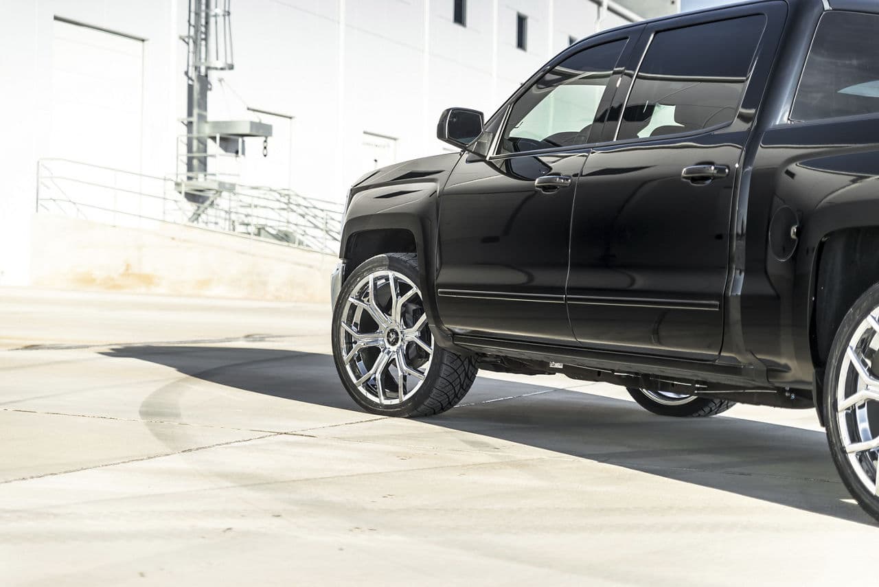 Rear view of 2015 Chevrolet Silverado with wheels