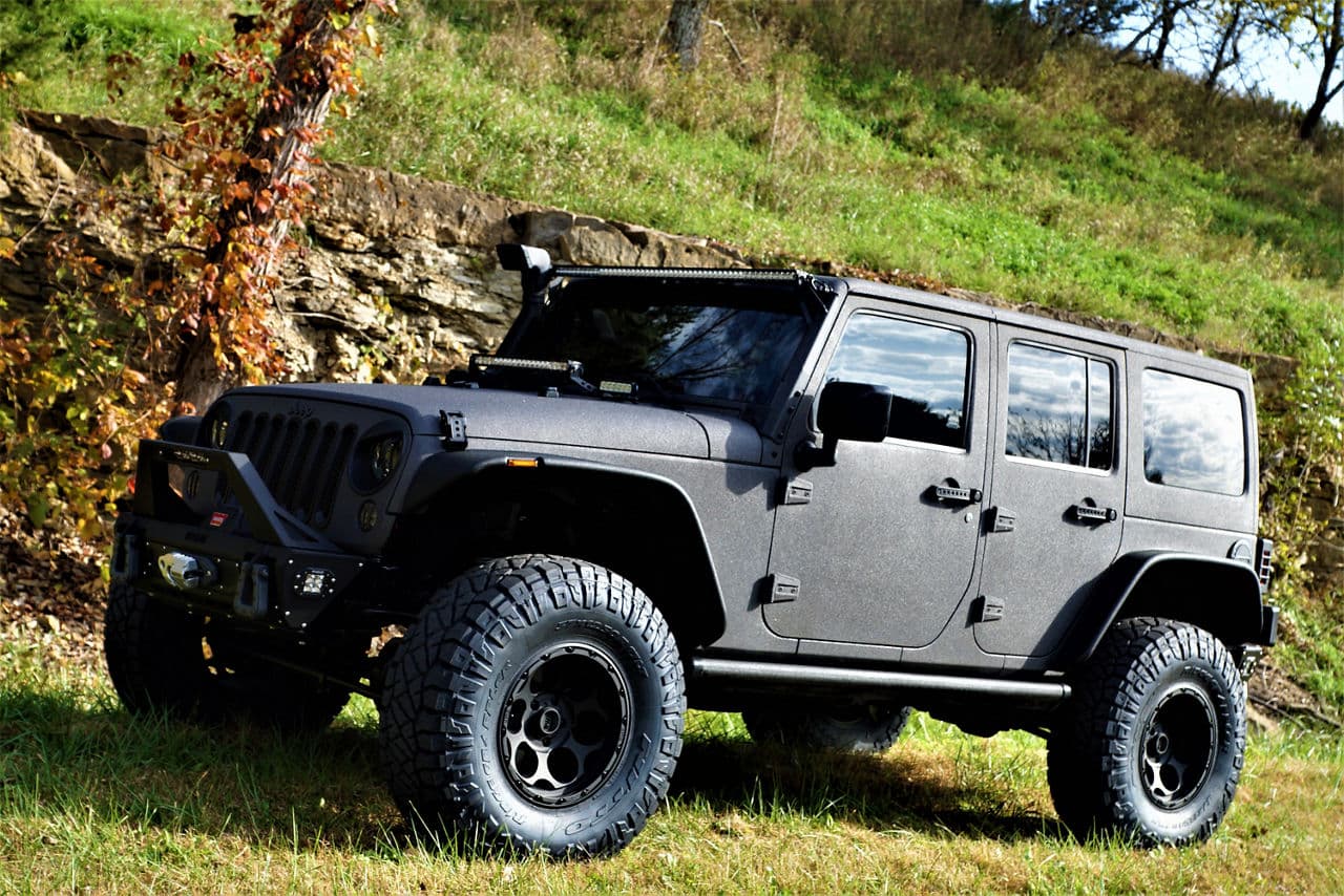 Front view of 2015 Jeep Wrangler Rubicon with wheels
