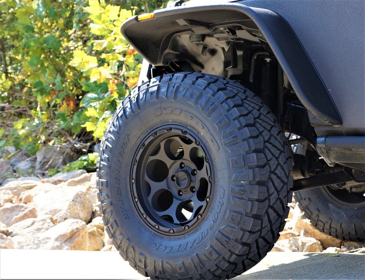 Rear view of 2015 Jeep Wrangler Rubicon with wheels