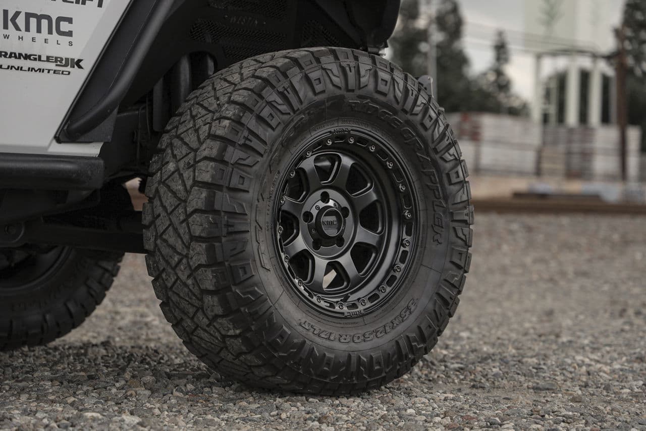 Side profile of 2015 Jeep Wrangler with truck suv wheels