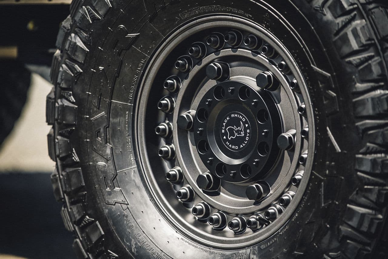 Side profile of 2015 Jeep Wrangler Unlimited with wheels