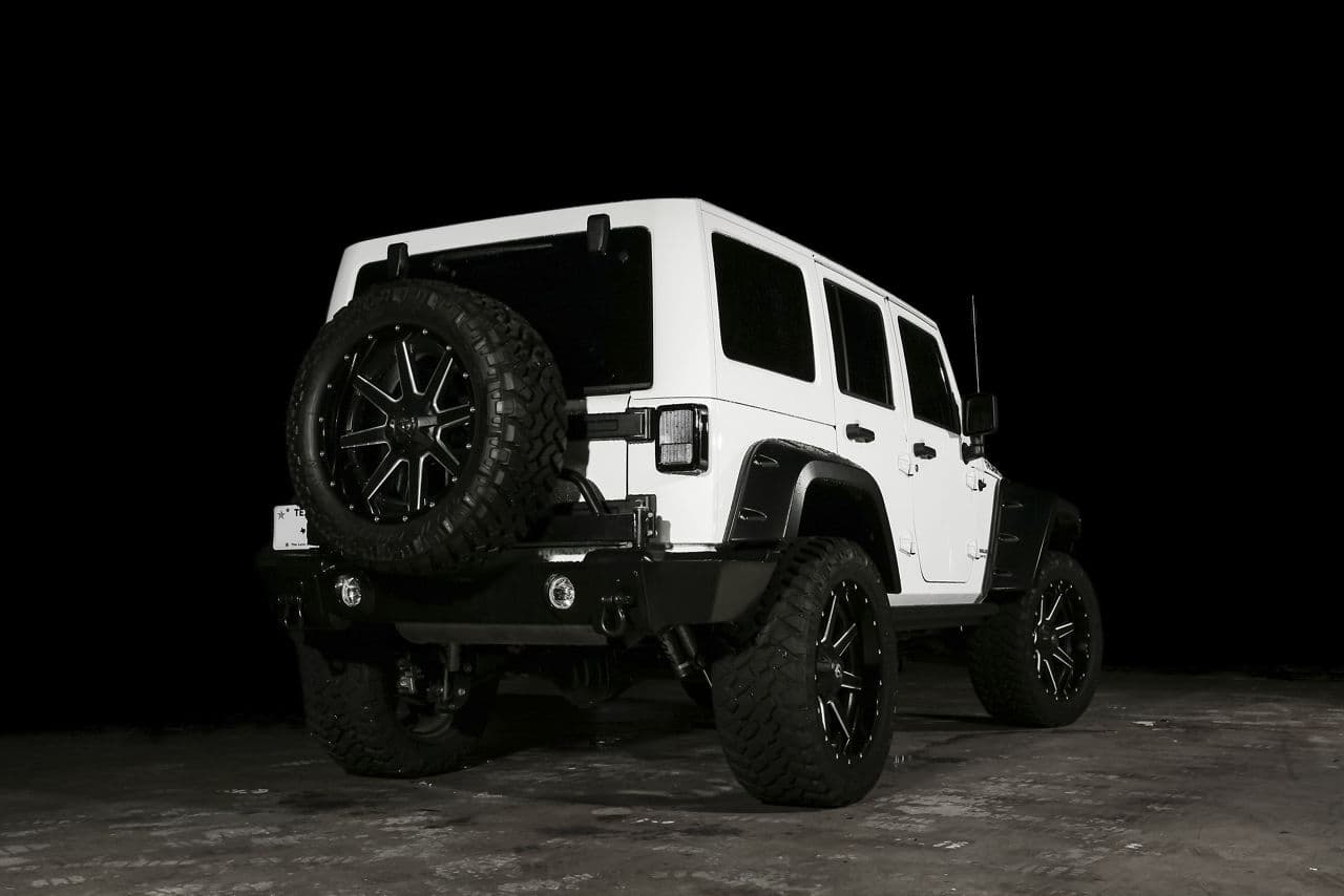Side profile of 2015 Jeep Wrangler with wheels