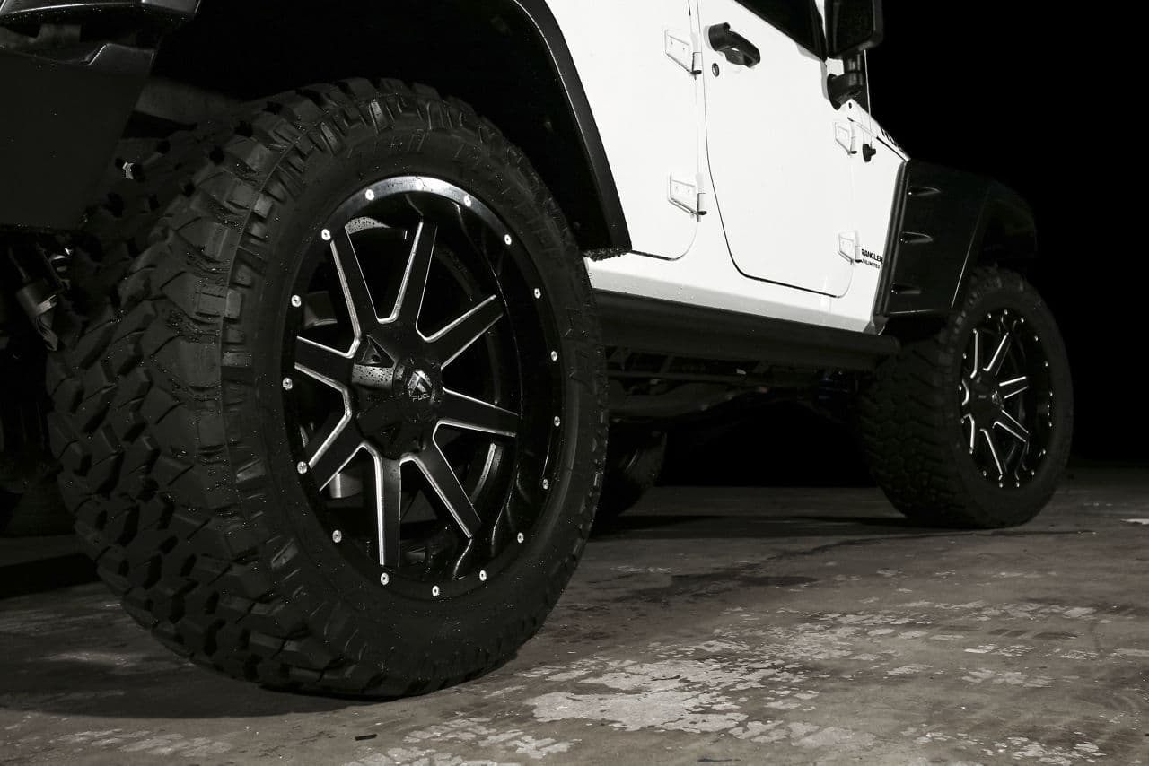 Rear view of 2015 Jeep Wrangler with wheels