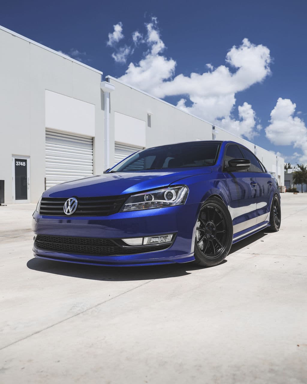 Rear view of 2015 Volkswagen Passat with wheels
