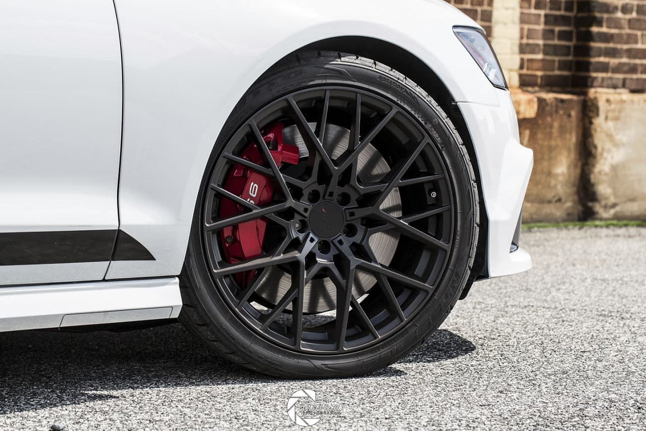 Rear view of 2016 Audi S6 with wheels