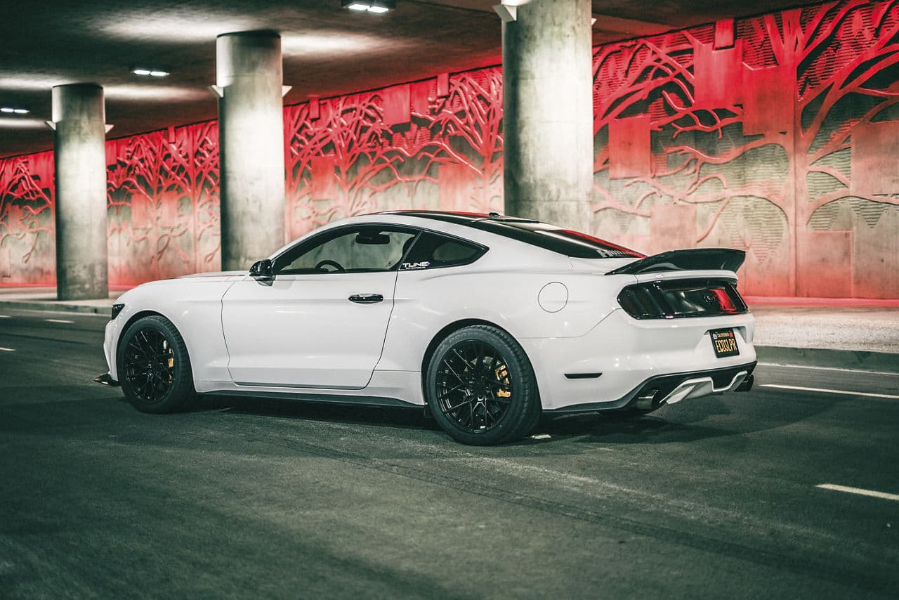 Side profile of 2016 Ford Mustang with wheels