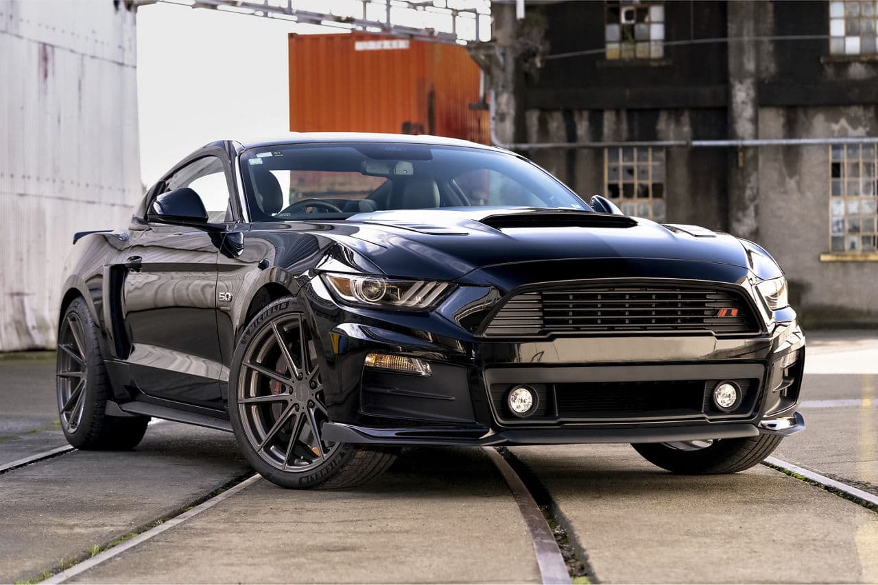 Side profile of 2016 Ford Mustang with wheels