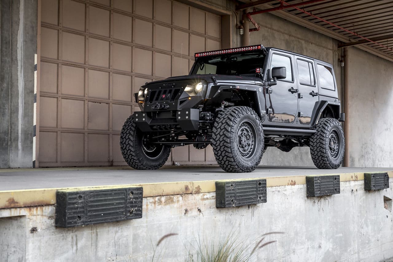 Side profile of 2016 Jeep Wrangler Rubicon with wheels