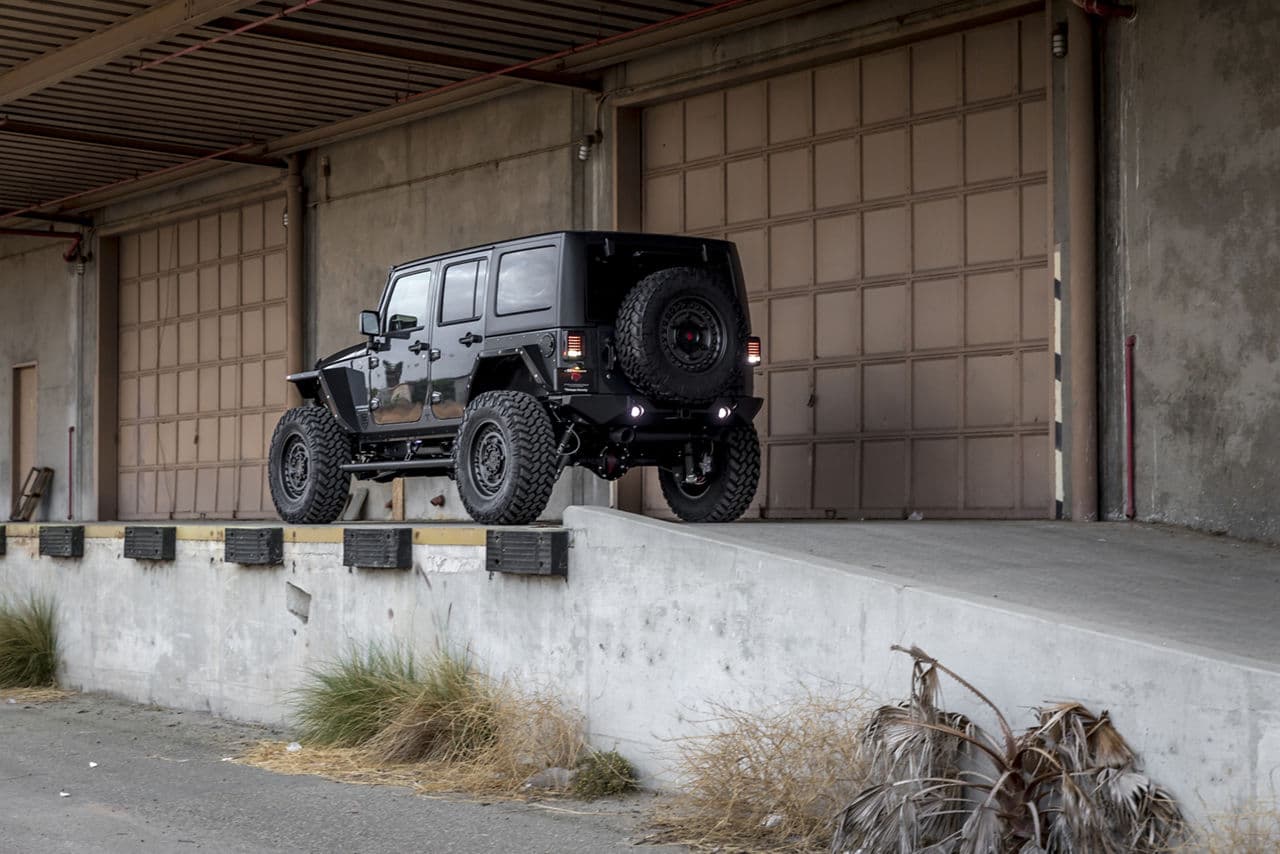 Rear view of 2016 Jeep Wrangler Rubicon with wheels