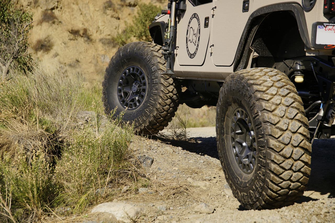 Side profile of 2016 Jeep Wrangler with truck and suv wheels