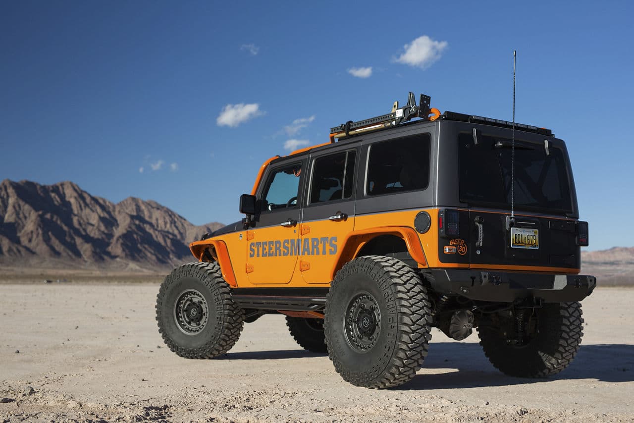 Rear view of 2016 Jeep Wrangler Unlimited with wheels