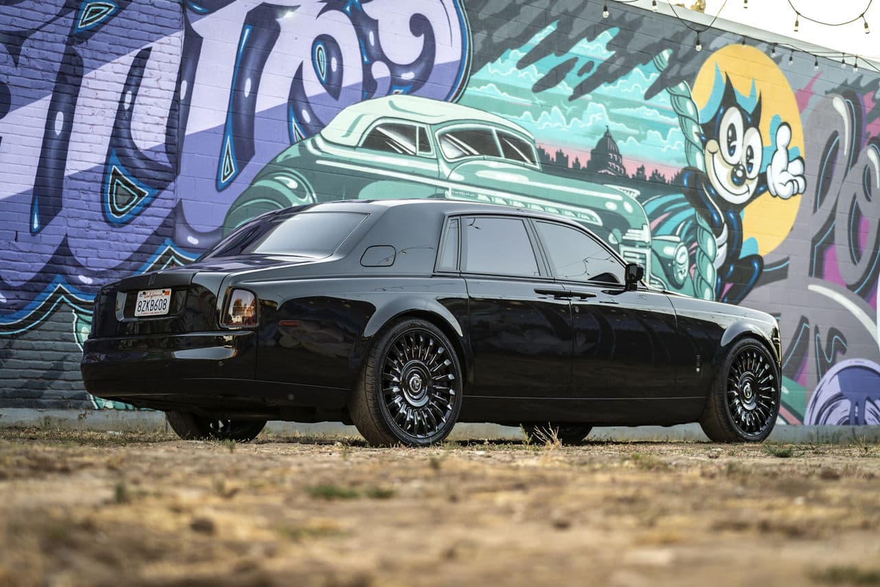 Rear view of 2016 Rolls-Royce Phantom with wheels