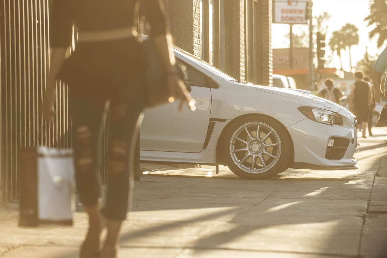 Side profile of 2016 Subaru WRX STI with wheels