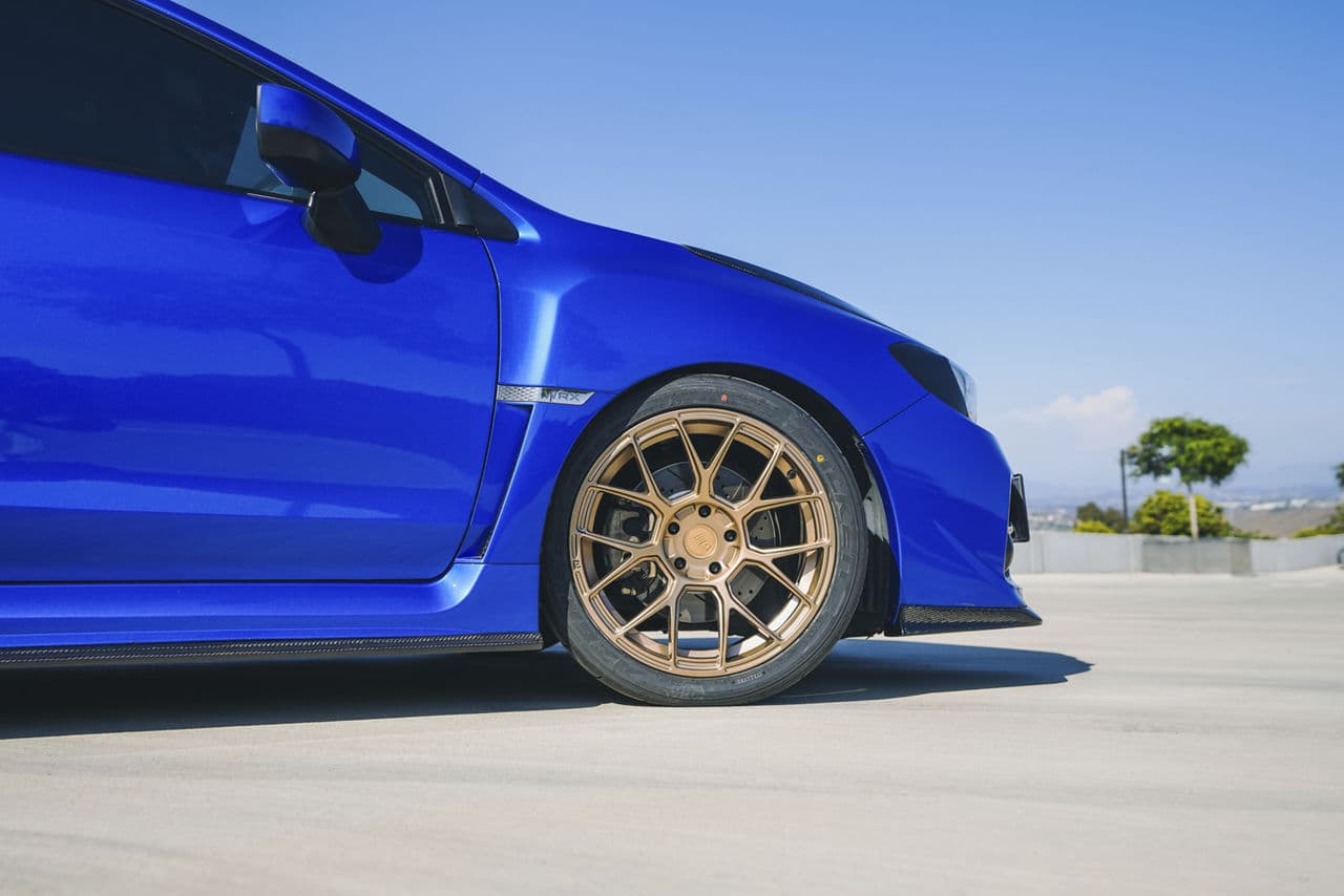 Side profile of 2016 Subaru WRX with wheels