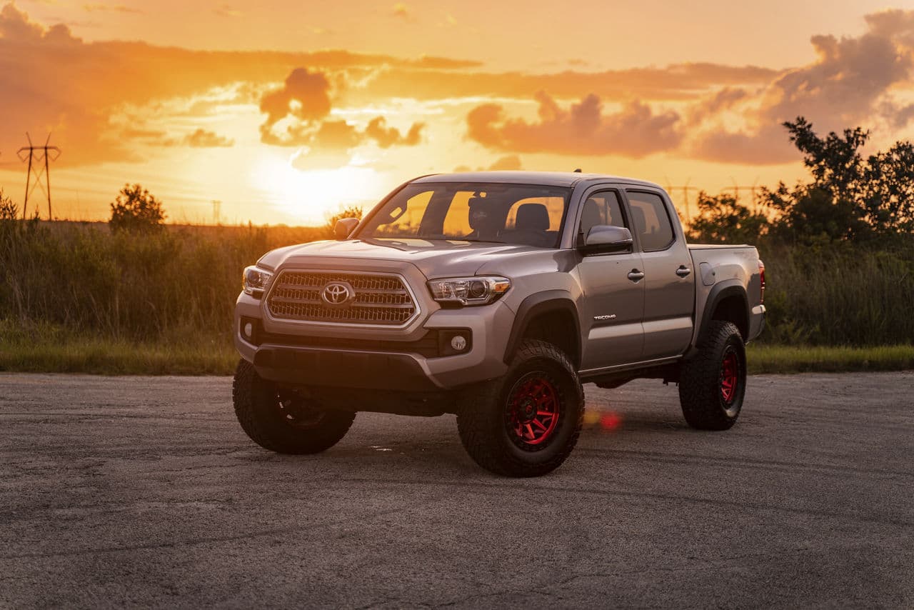 Front view of 2016 Toyota Tacoma with vehicle wraps