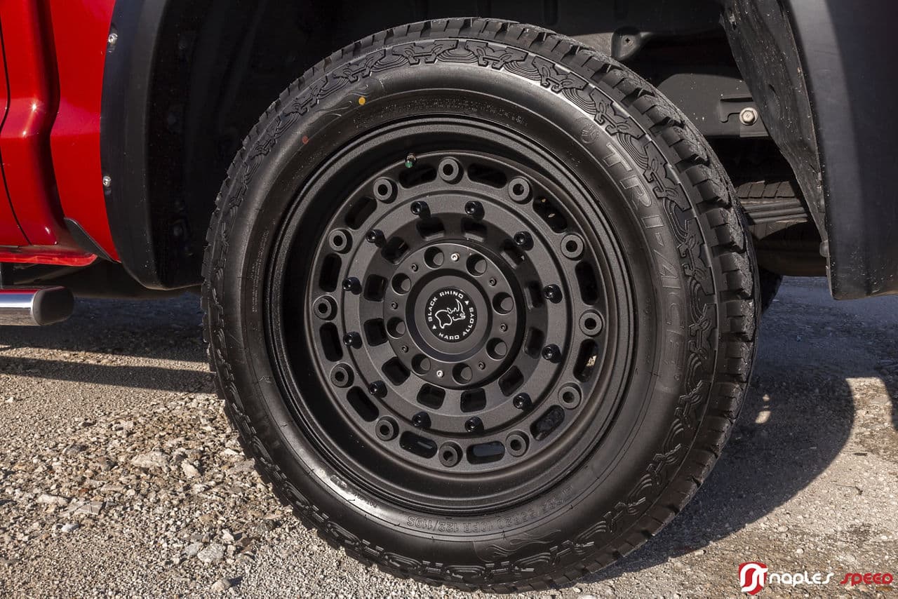 Rear view of 2016 Toyota Tundra with custom wheels and tires