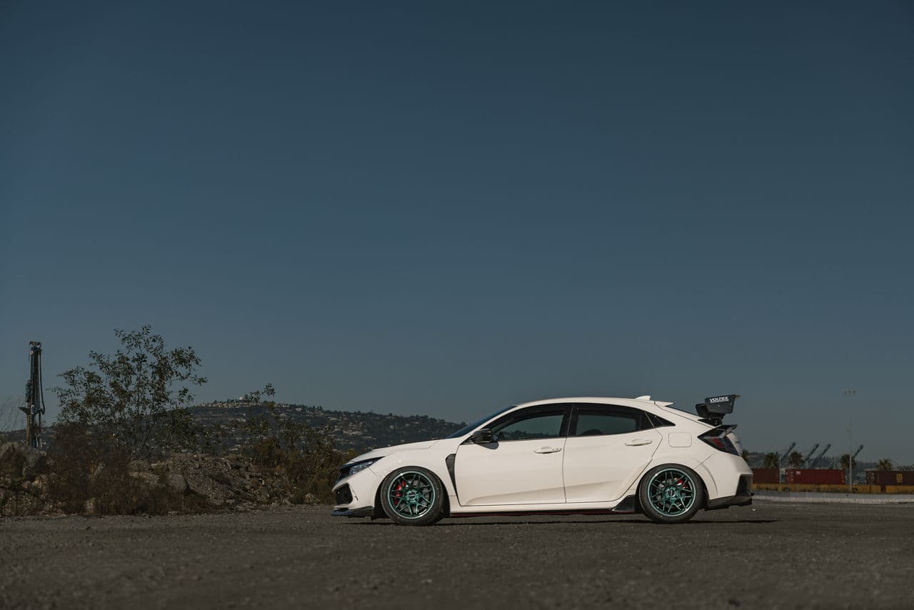 Side profile of 2017 Honda Civic Type R with wheels