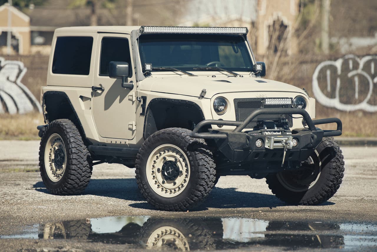Front view of 2017 Jeep Wrangler Rubicon with truck suv wheels