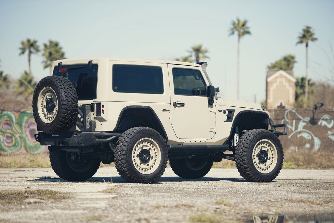 Side profile of 2017 Jeep Wrangler Rubicon with truck suv wheels