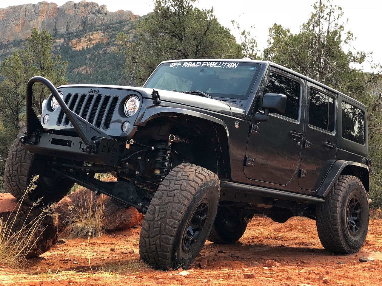 Front view of 2017 Jeep Wrangler with truck suv wheels
