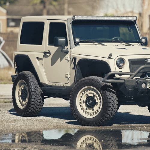 Side profile of 2017 Jeep Wrangler with truck suv wheels