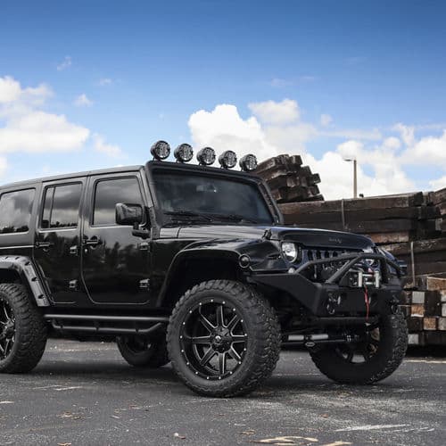 Detail view of 2017 Jeep Wrangler with truck suv wheels