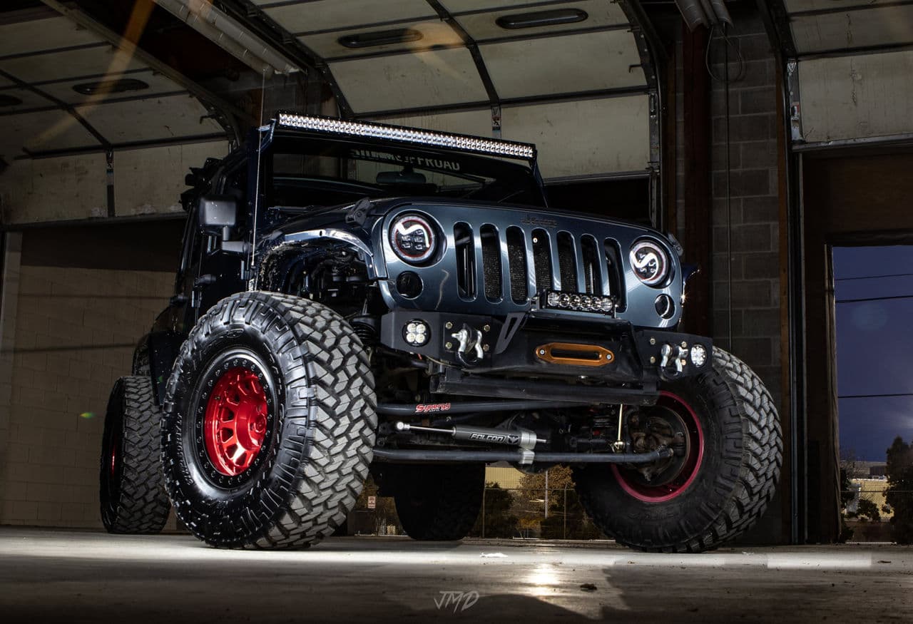 Front view of 2017 Jeep Wrangler with vehicle wraps