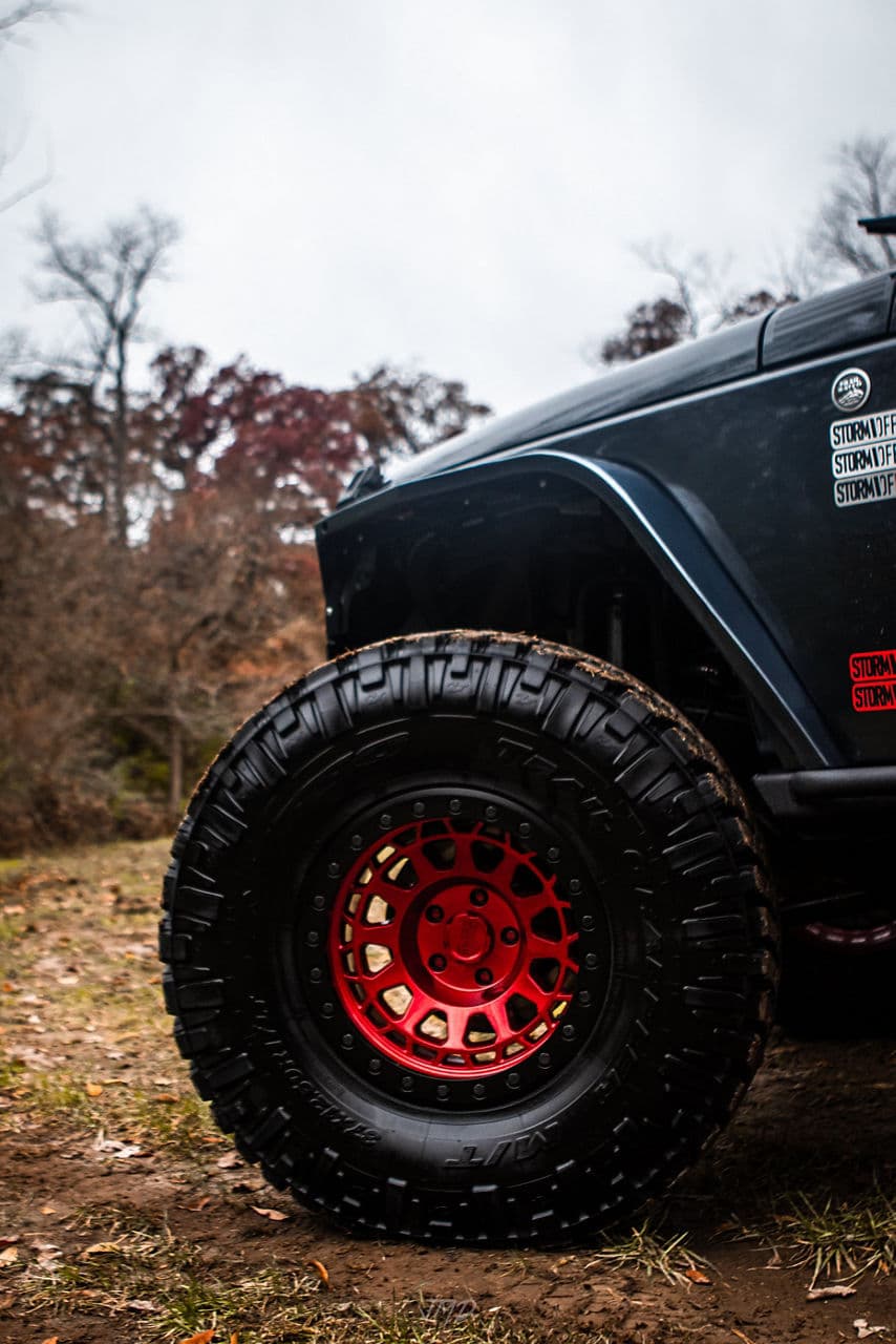 Rear view of 2017 Jeep Wrangler with vehicle wraps