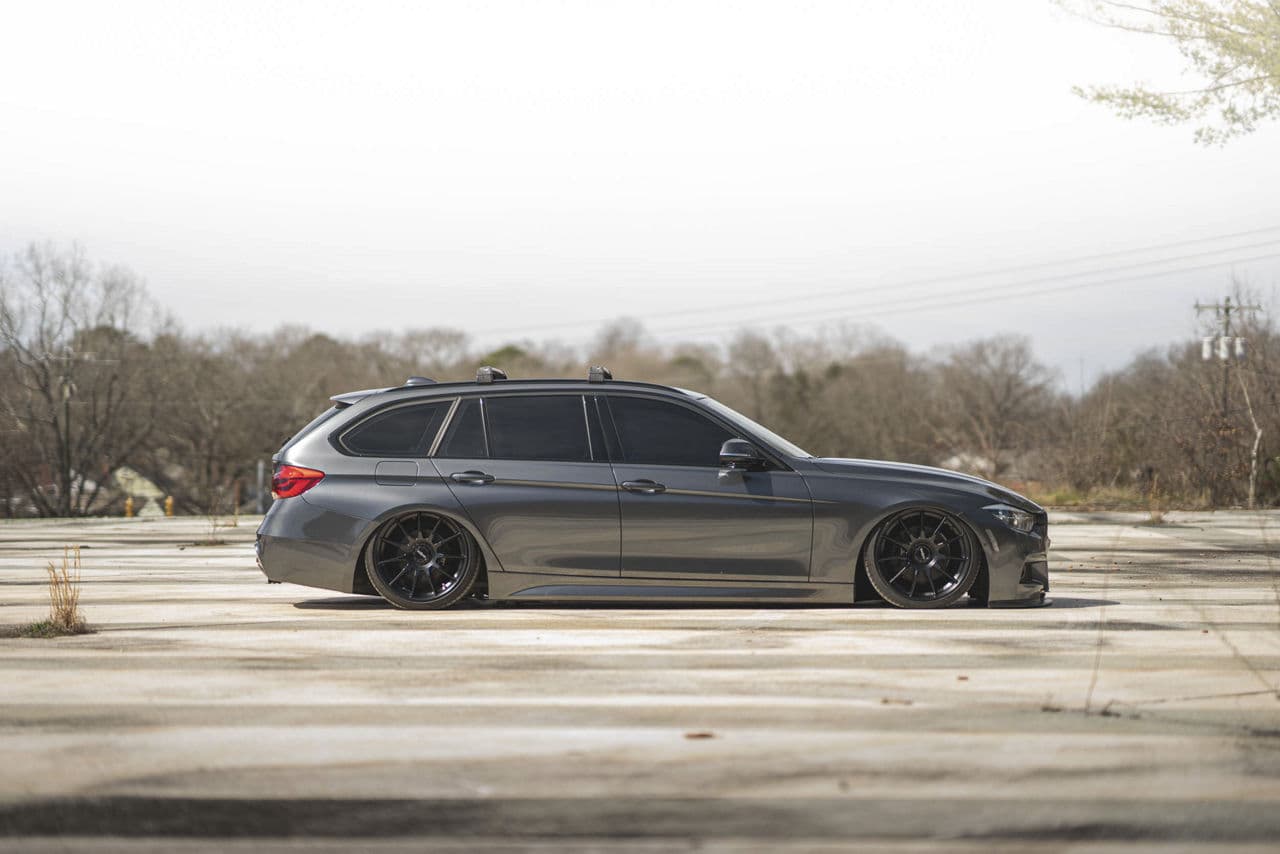 Side profile of 2018 BMW 330i X-Drive with wheels