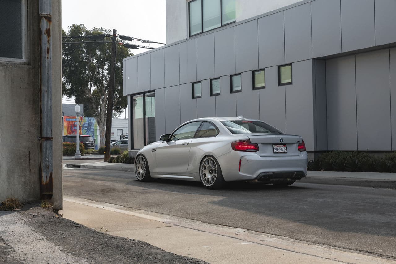 Rear view of 2018 BMW M2 with wheels