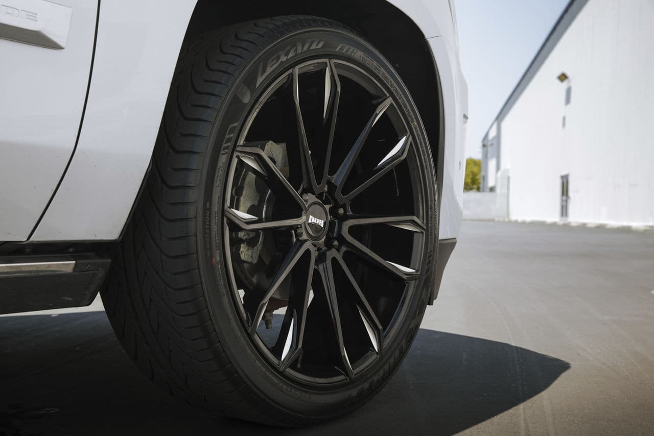 Rear view of 2018 Cadillac Escalade with wheels