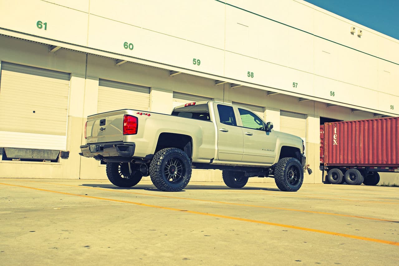 Rear view of 2018 Chevrolet Silverado with wheels