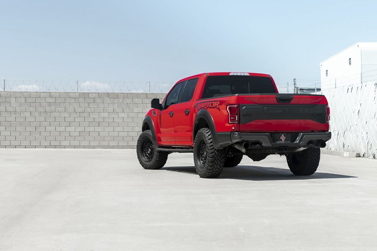 Rear view of 2018 Ford F150 Raptor with truck suv wheels