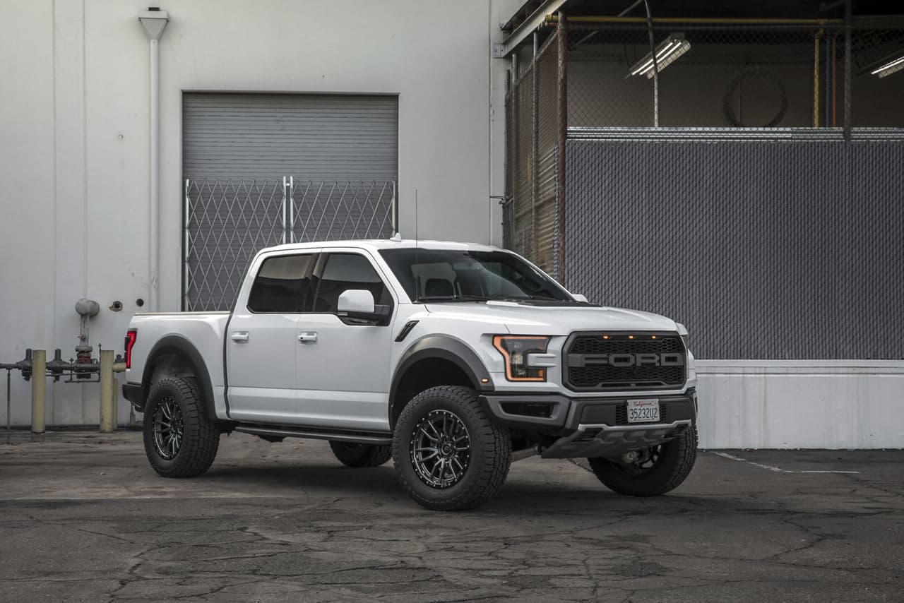 Front view of 2018 Ford F150 Raptor with truck suv wheels