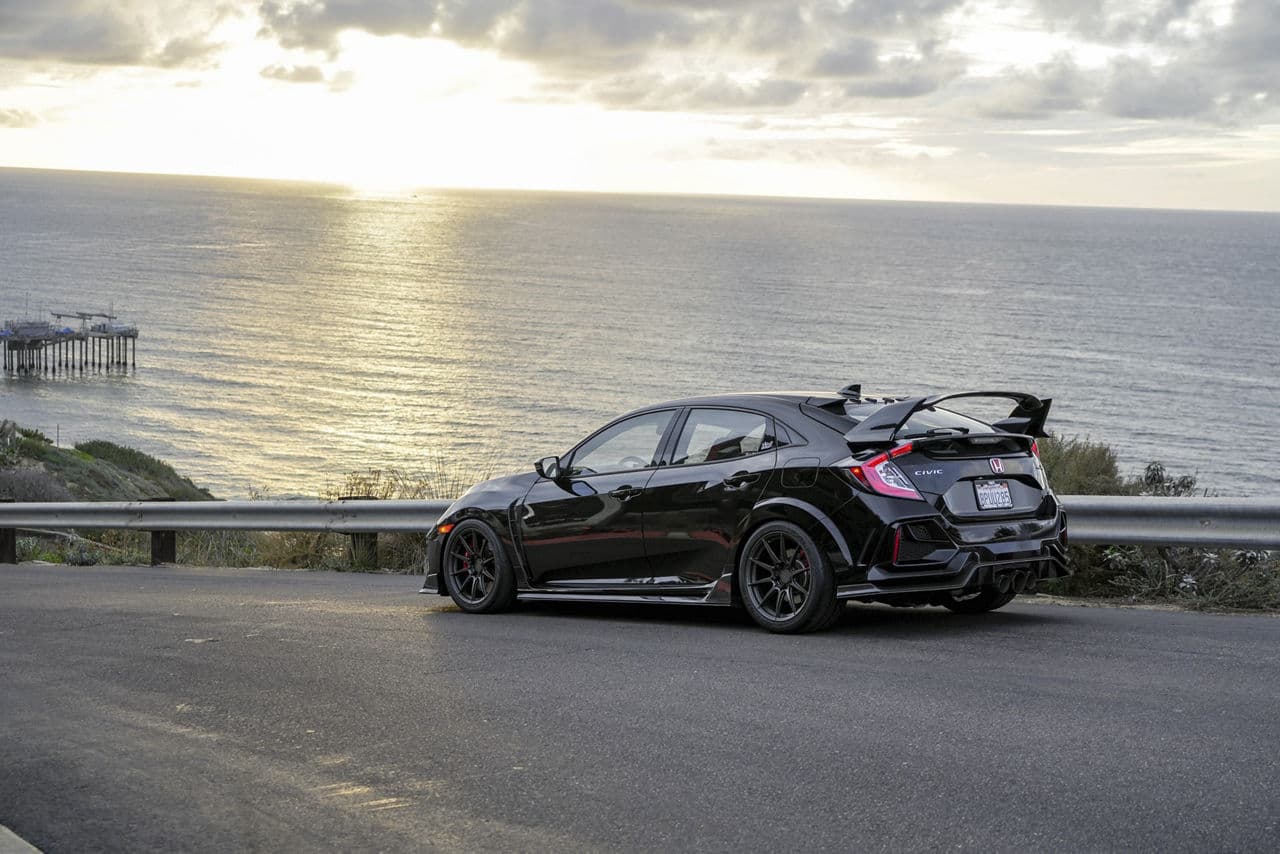 Side profile of 2018 Honda Civic Type R with tuner wheels