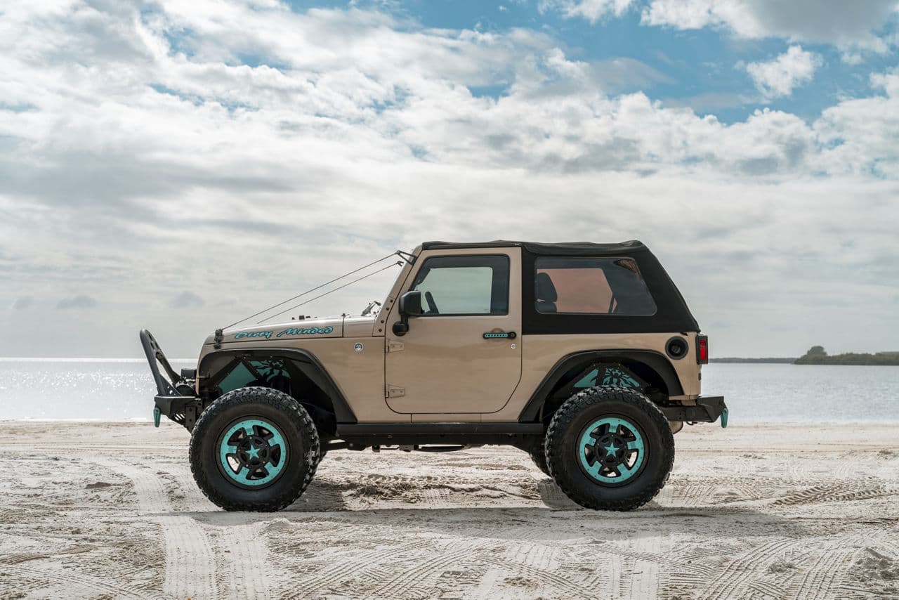 Side profile of 2018 Jeep Wrangler with wheels