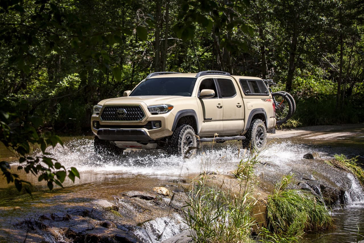 Front view of 2018 Toyota Tacoma with truck suv wheels