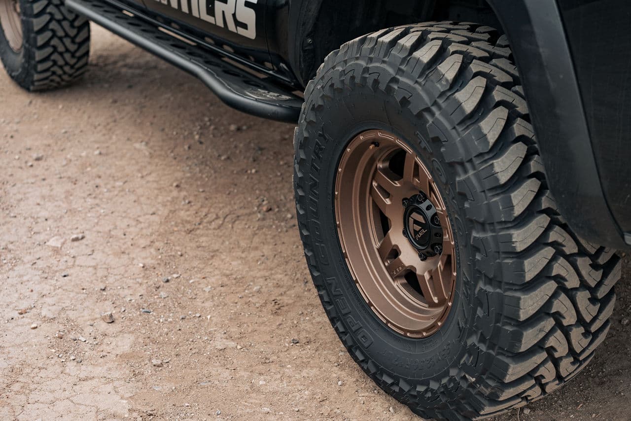Side profile of 2018 Toyota Tacoma with truck suv wheels