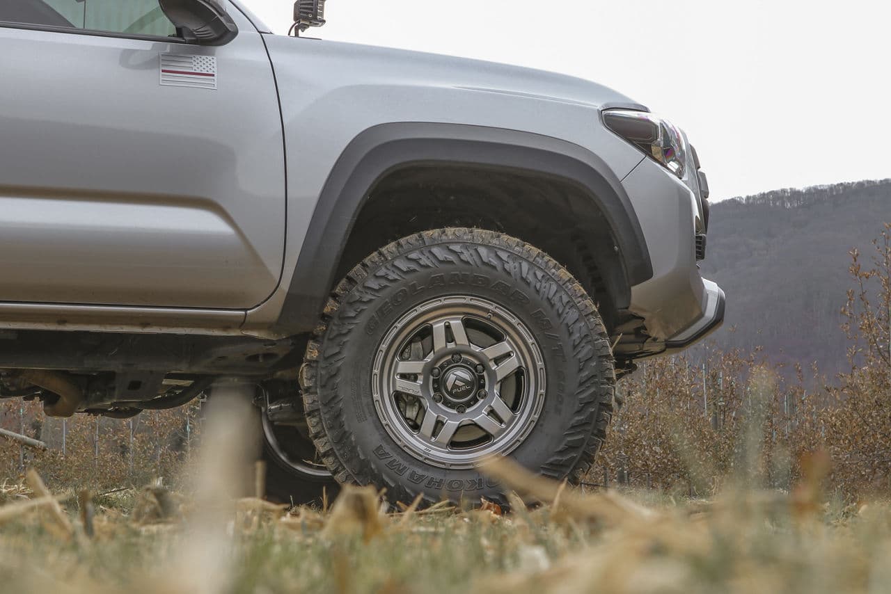 Side profile of 2018 Toyota Tacoma with truck suv wheels