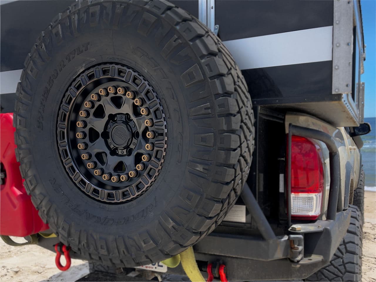 Side profile of 2018 Toyota Tacoma with wheels