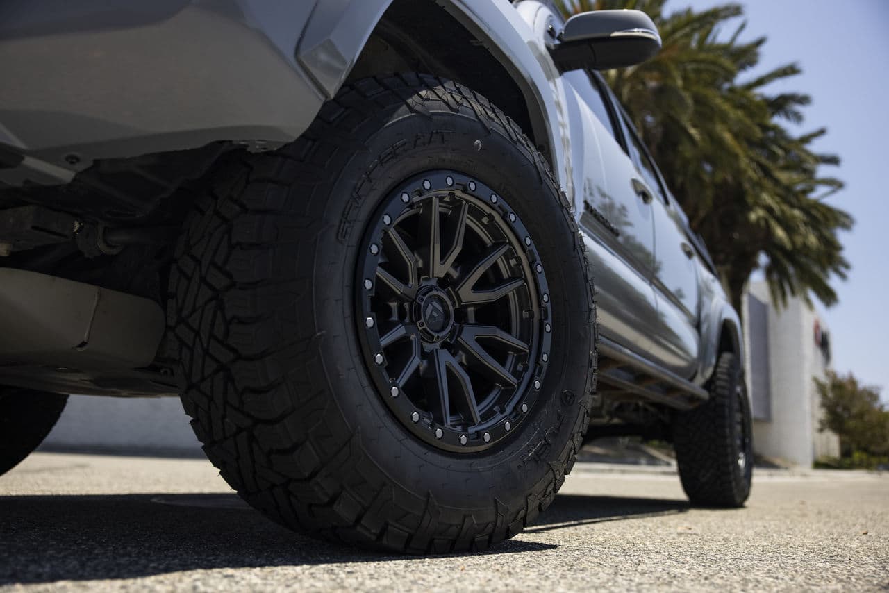 Side profile of 2018 Toyota Tacoma with wheels