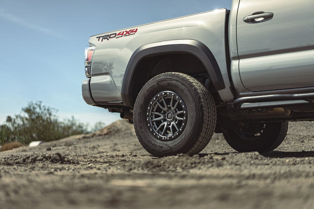Side profile of 2018 Toyota Tacoma with wheels