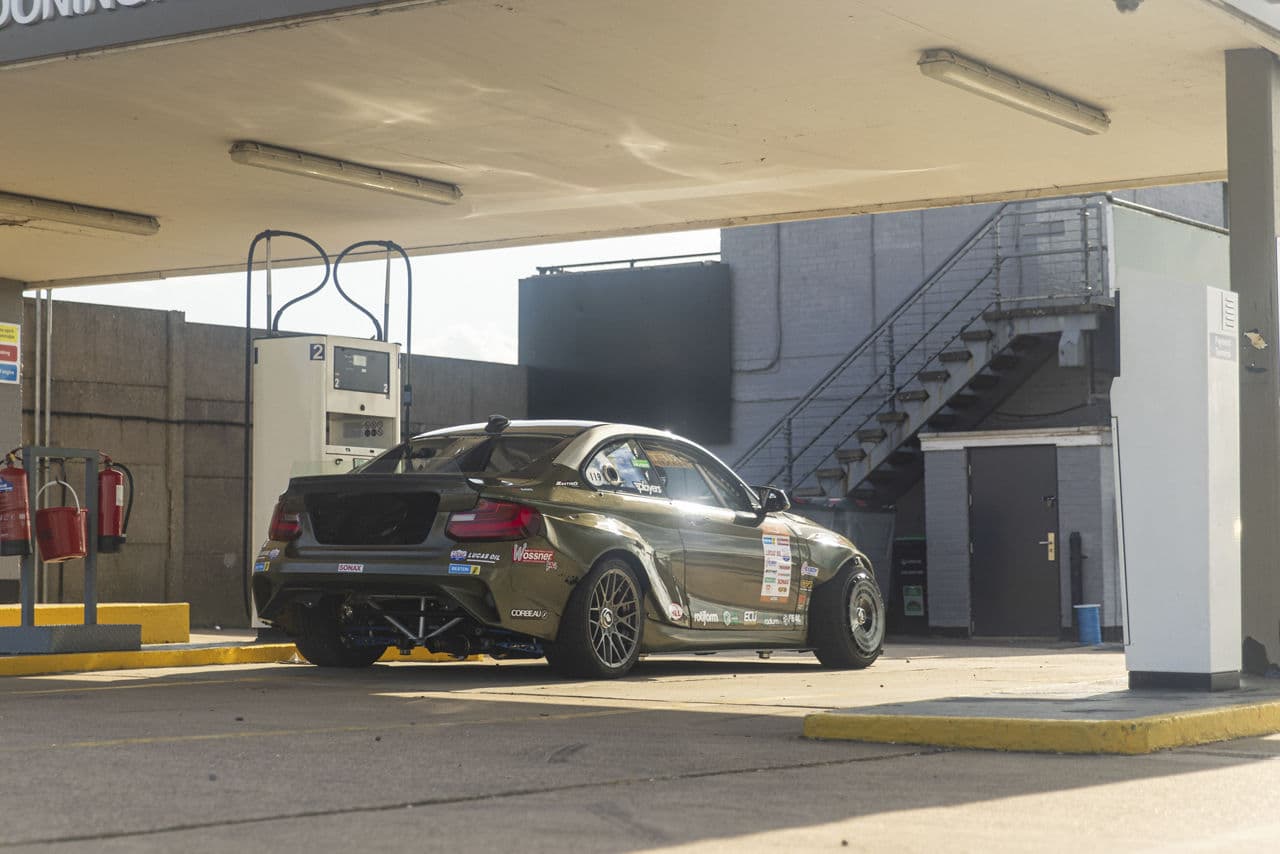 Rear view of 2019 BMW M4 with wheels