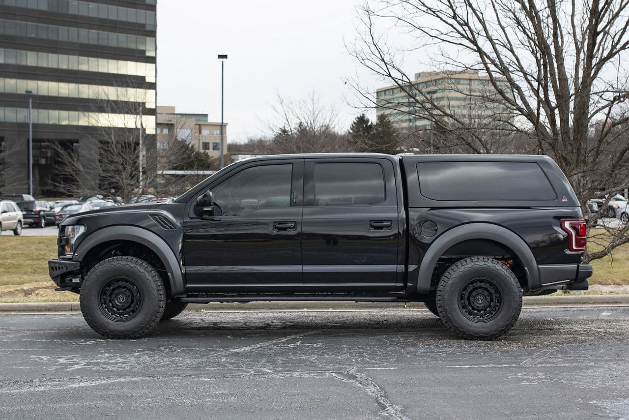 Side profile of 2019 Ford F150 Raptor with truck suv wheels