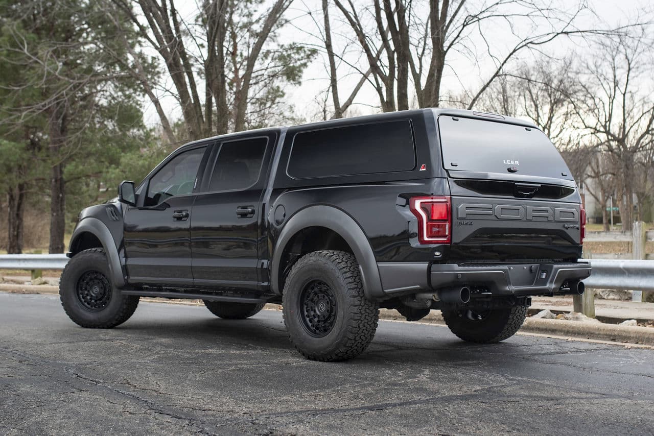 Rear view of 2019 Ford F150 Raptor with truck suv wheels