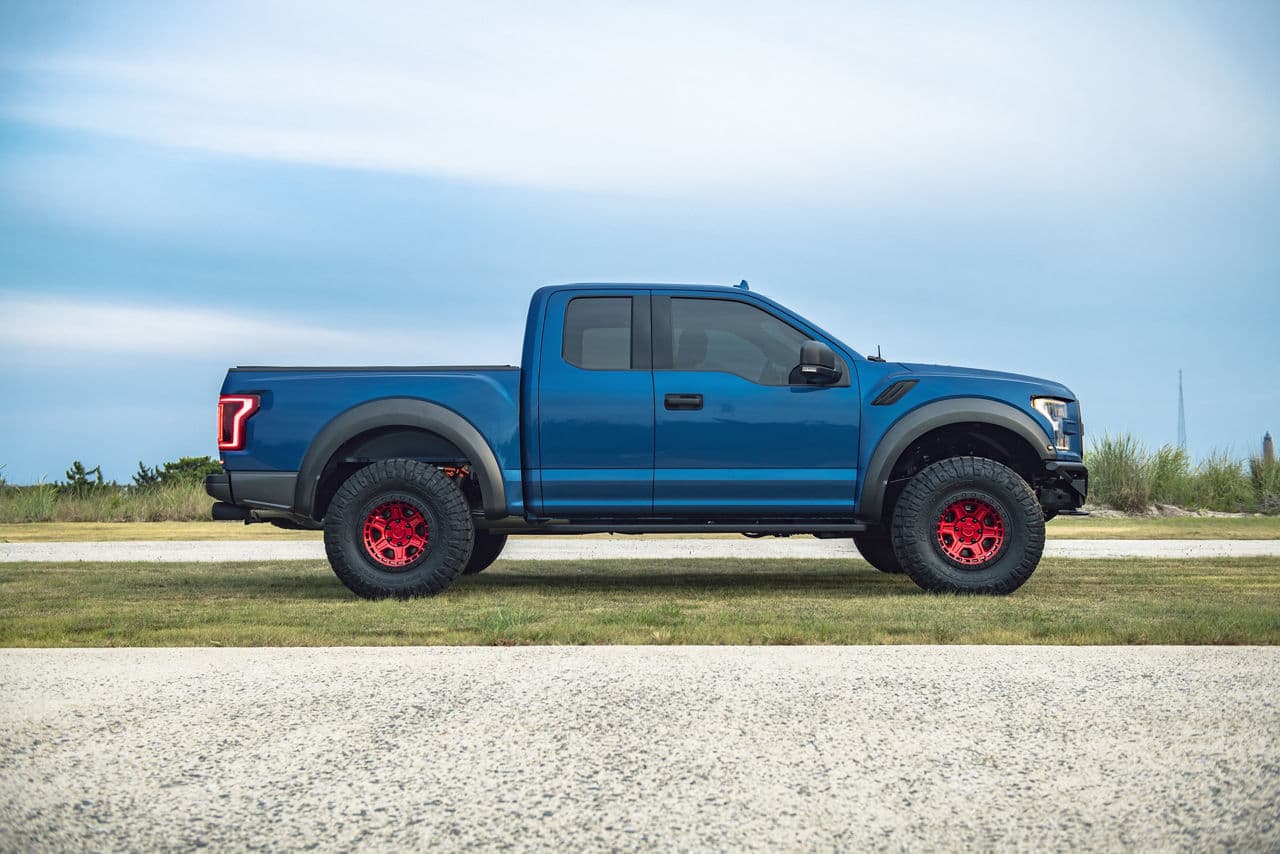 Side profile of 2019 Ford F150 Raptor with truck suv wheels